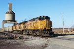 UP 7177 leads coal empties from Weston